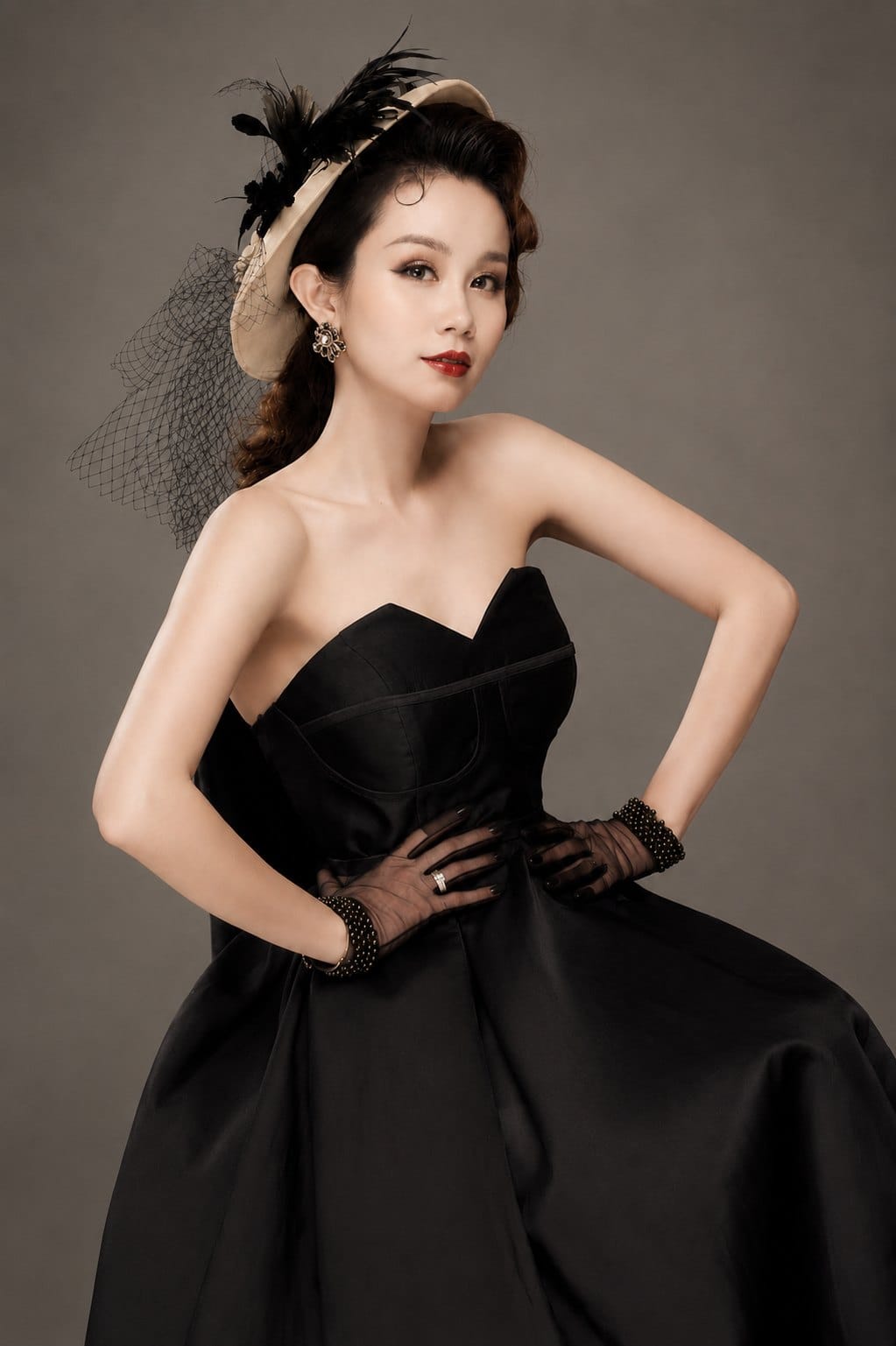 Son, founder of Sonthuy Beauty, in a black gown